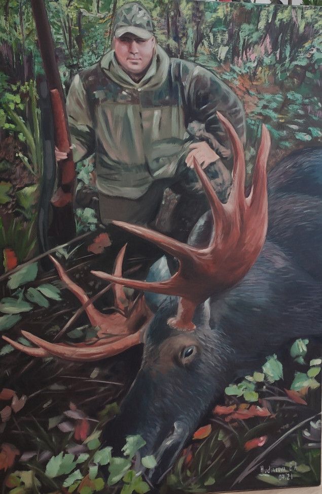 Охотник с трофеем