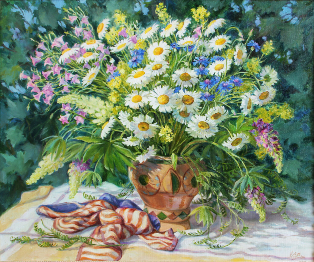 Букет с ромашками в саду