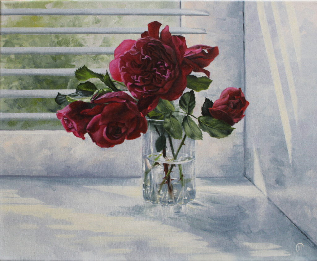 Розы в стеклянном стакане