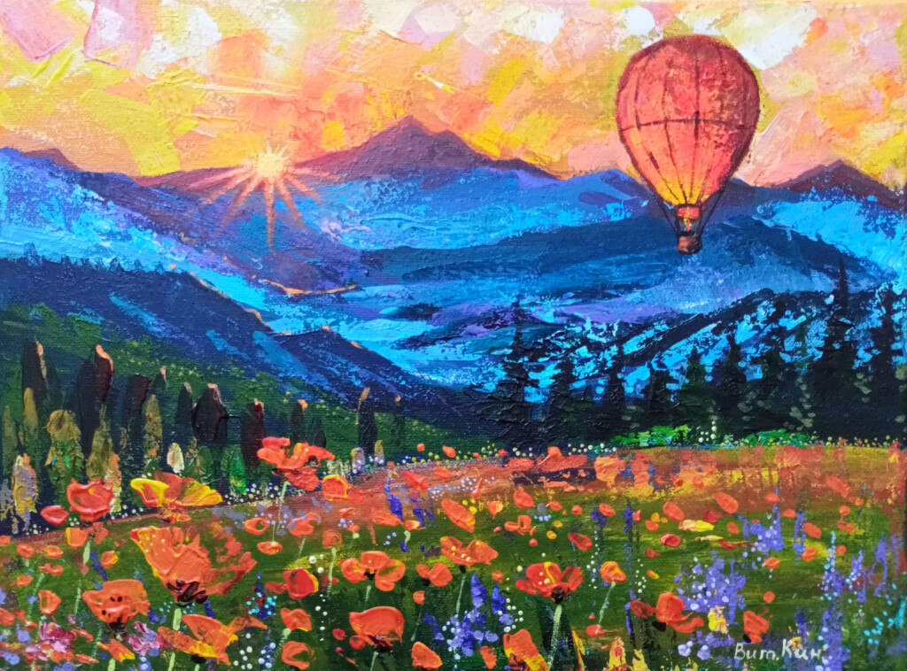 На большом воздушном шаре мандаринового цвета