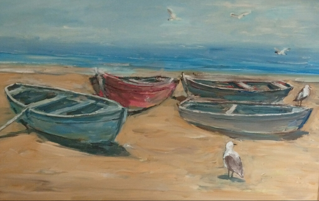 Лодки на берегу моря