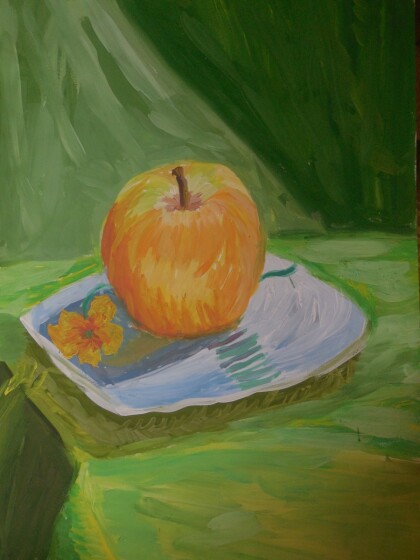 Яблоко на тарелке