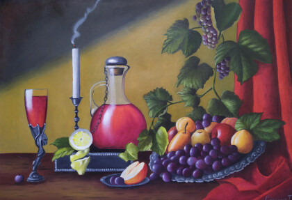 Натюрморт с красным вином и свечей и виноградом.