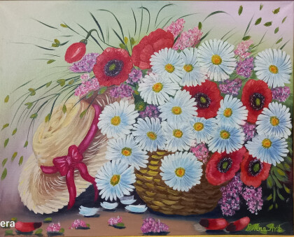 Букет в корзине и соломенная шляпа